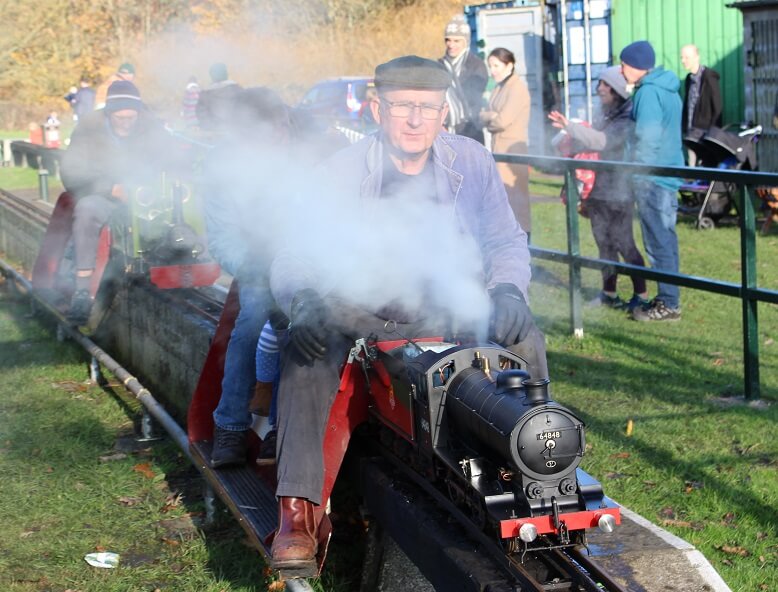 Geoff with loco in station at birthday party